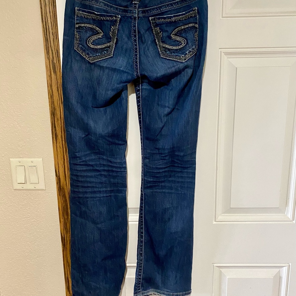 Silver Suki Jeans Dark Blue Boot Cut Jeans with Embroidered Pockets